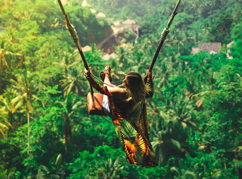 woman riding swing